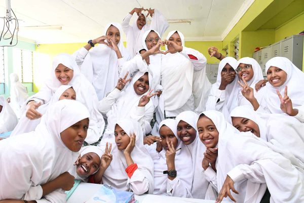 JSS STUDENTS IN CLASS - GIRLS STRIKE A POSE